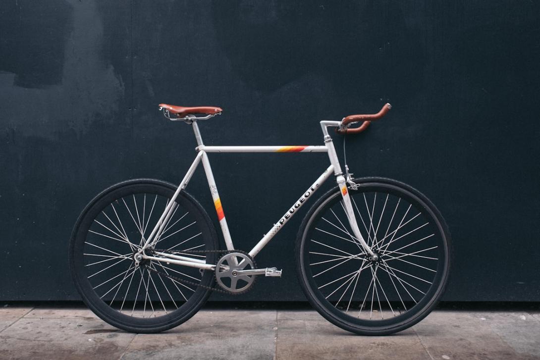 Bicycle leaning against a road
